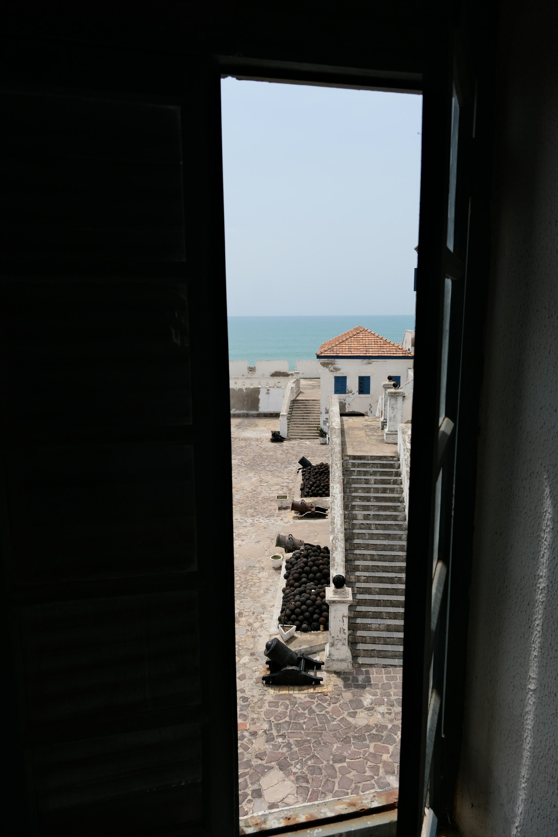 A doorway in Cape Coast Castle opening onto the Atlantic Ocean